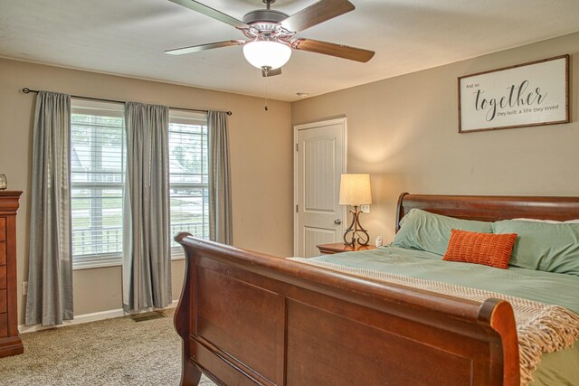 143 Rachelle Pl, Baxter, TN 38544 - bedroom featuring light carpet, baseboards, and a ceiling fan