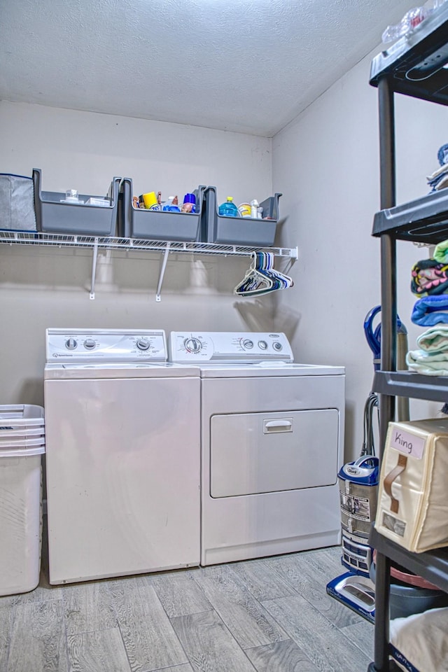143 Rachelle Pl, Baxter, TN 38544 - washroom with independent washer and dryer, wood finished floors, and a textured ceiling