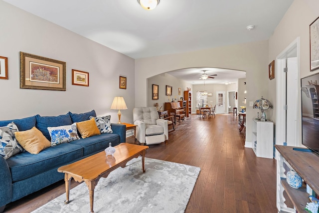 1648 Foston Ln, Gallatin, TN 37066 - living area with arched walkways, a ceiling fan, and dark wood-type flooring