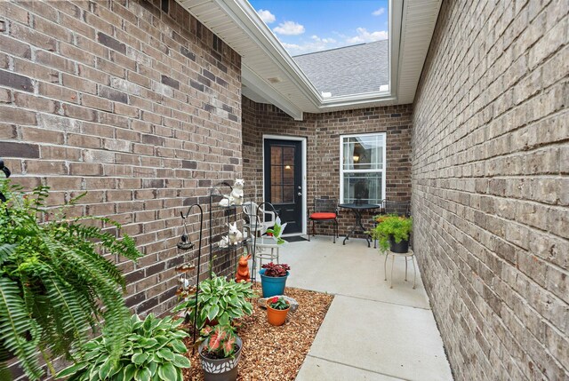 1648 Foston Ln, Gallatin, TN 37066 - entrance to property with brick siding and a patio