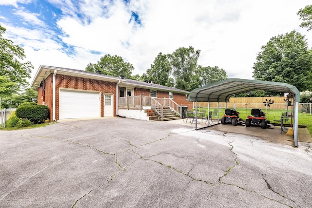435 Richland Cir, Gallatin, TN 37066 - view of front of property featuring driveway, a garage, brick siding, and a carport