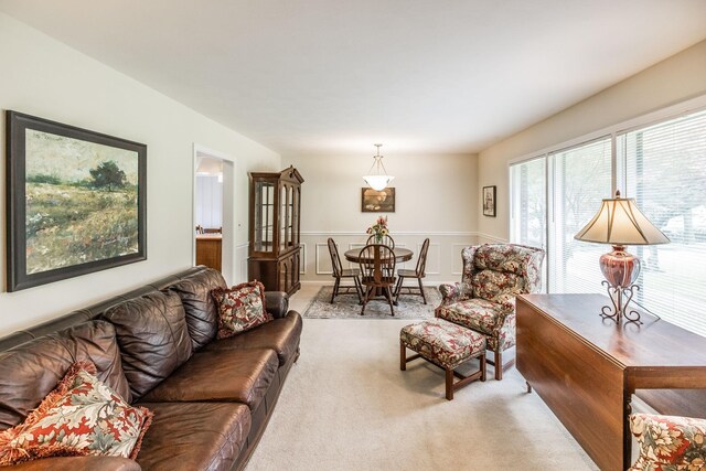 435 Richland Cir, Gallatin, TN 37066 - living area with carpet flooring and a wainscoted wall