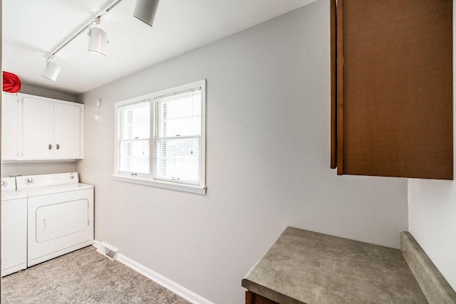 435 Richland Cir, Gallatin, TN 37066 - laundry room featuring washer and clothes dryer, cabinet space, and track lighting