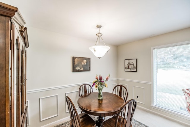435 Richland Cir, Gallatin, TN 37066 - carpeted dining room with wainscoting and a decorative wall