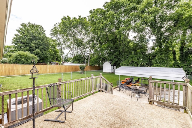 435 Richland Cir, Gallatin, TN 37066 - fenced backyard featuring a storage unit, outdoor dining area, and a patio