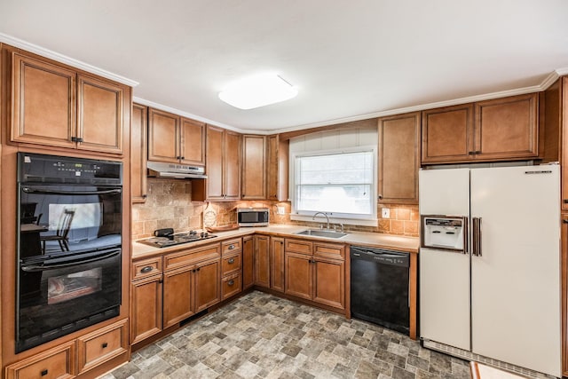 435 Richland Cir, Gallatin, TN 37066 - kitchen featuring black appliances, brown cabinets, backsplash, and light countertops