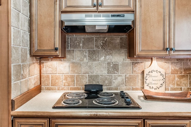 435 Richland Cir, Gallatin, TN 37066 - kitchen featuring extractor fan, black electric stovetop, light countertops, and decorative backsplash