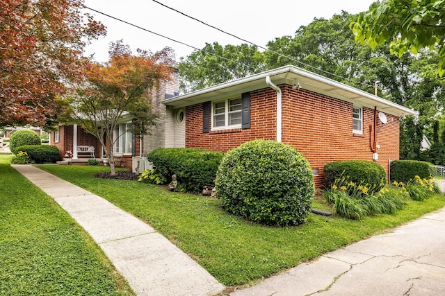 435 Richland Cir, Gallatin, TN 37066 - view of side of property with brick siding, a yard, and a chimney