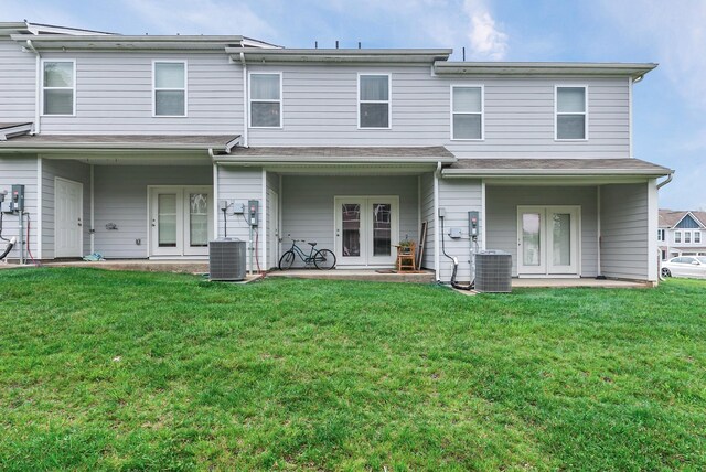 803 Dallas Dr, Columbia, TN 38401 - rear view of property with french doors, central AC unit, and a yard
