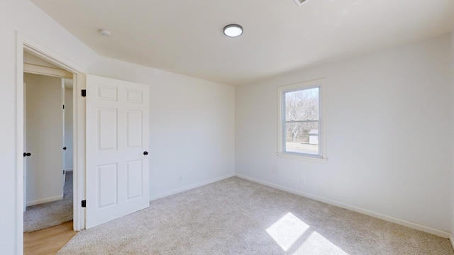 121 Highland St, La Vergne, TN 37086 - unfurnished room featuring light colored carpet, baseboards, and a smoke detector