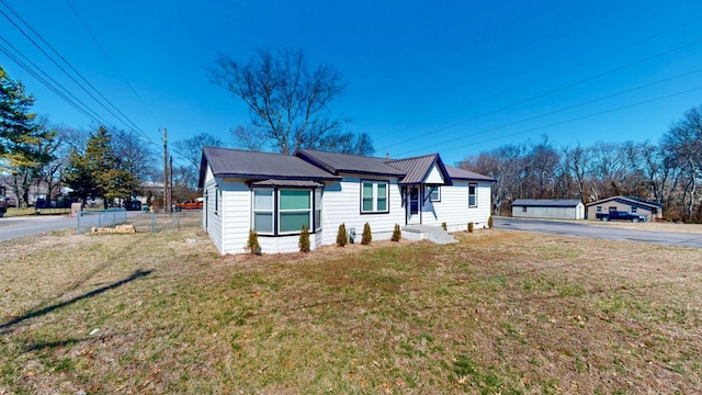 121 Highland St, La Vergne, TN 37086 - view of front of property featuring asphalt driveway and metal roof