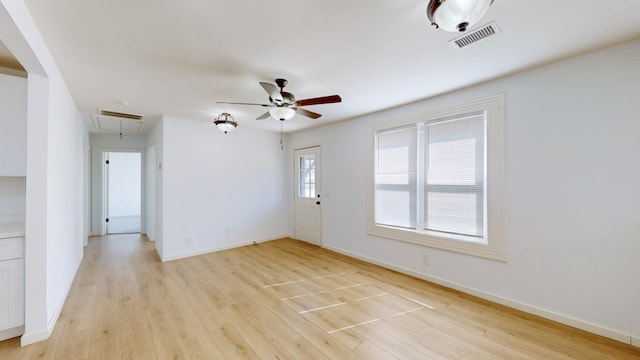 121 Highland St, La Vergne, TN 37086 - empty room featuring attic access, ceiling fan, light wood finished floors, and baseboards