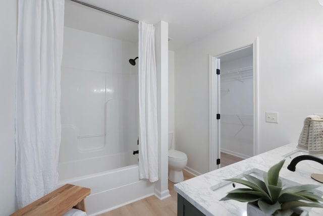 3755 Indian Creek Blvd, Murfreesboro, TN 37128 - full bathroom featuring vanity, shower / tub combo with curtain, toilet, wood finished floors, and a walk in closet