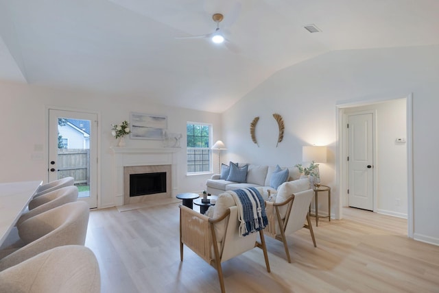 3755 Indian Creek Blvd, Murfreesboro, TN 37128 - living room featuring a ceiling fan, light wood-type flooring, lofted ceiling, a fireplace, and baseboards