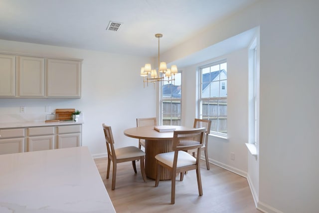 3755 Indian Creek Blvd, Murfreesboro, TN 37128 - dining area featuring a chandelier, light wood finished floors, and baseboards
