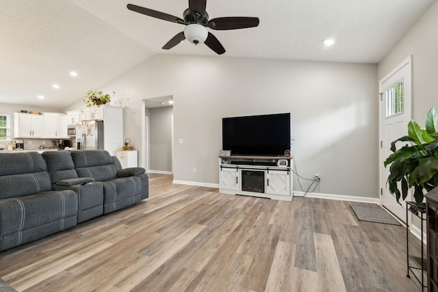 125 Vivian Ln, Carthage, TN 37030 - living area with light wood finished floors, ceiling fan, vaulted ceiling, baseboards, and recessed lighting