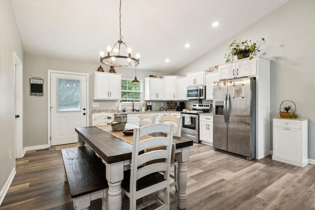 125 Vivian Ln, Carthage, TN 37030 - dining area with a chandelier, light wood-style floors, recessed lighting, baseboards, and vaulted ceiling