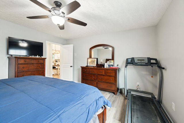 125 Vivian Ln, Carthage, TN 37030 - bedroom featuring light wood-style floors, a textured ceiling, and ceiling fan
