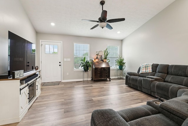 125 Vivian Ln, Carthage, TN 37030 - living room with a ceiling fan, baseboards, light wood-style floors, a textured ceiling, and recessed lighting