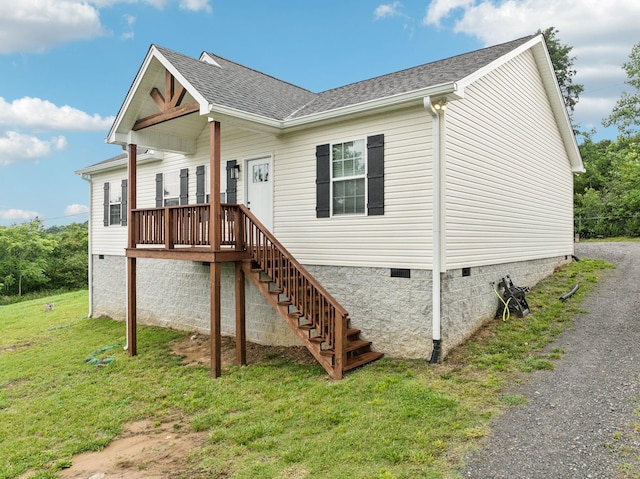 125 Vivian Ln, Carthage, TN 37030 - view of front of house with crawl space, a front lawn, roof with shingles, and stairway