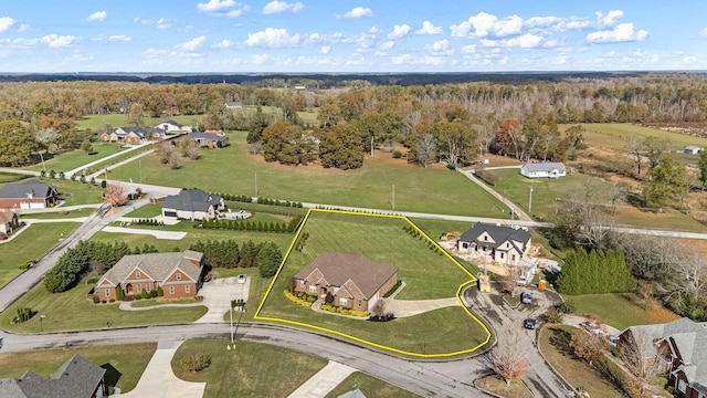 103 Rosehaven Ct, Tullahoma, TN 37388 - aerial view of property and surrounding area with property parcel outlined, nearby suburban area, and a heavily wooded area