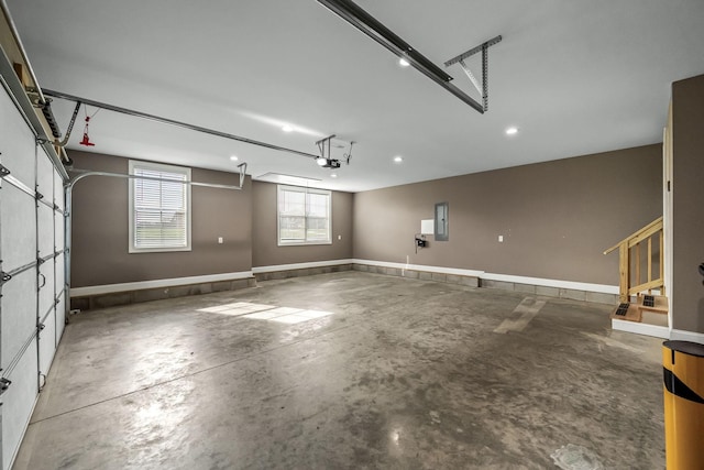 103 Rosehaven Ct, Tullahoma, TN 37388 - garage with a garage door opener, electric panel, baseboards, and recessed lighting