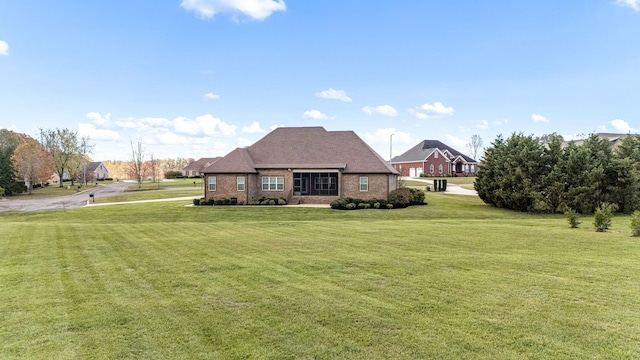 103 Rosehaven Ct, Tullahoma, TN 37388 - view of home's exterior featuring a yard and brick siding