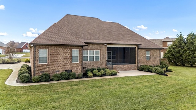 103 Rosehaven Ct, Tullahoma, TN 37388 - back of property featuring brick siding, crawl space, a yard, and a sunroom