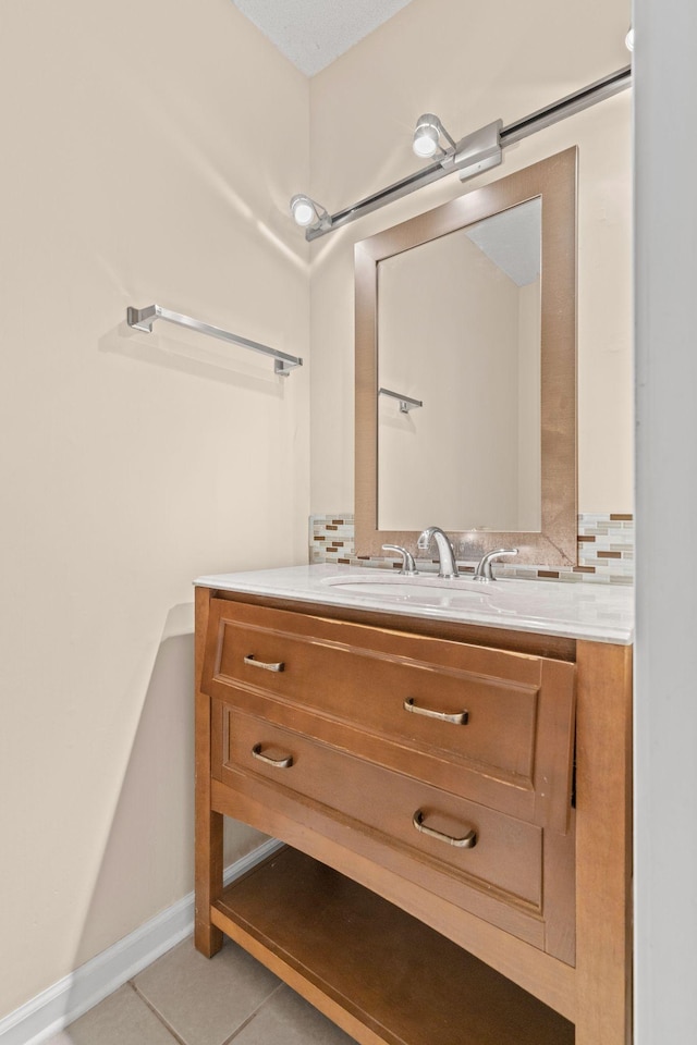 108 Agee Cir W, Hendersonville, TN 37075 - bathroom featuring vanity, tile patterned floors, baseboards, and backsplash