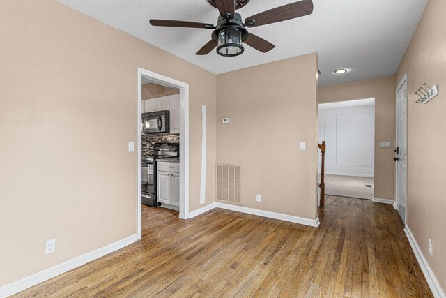 108 Agee Cir W, Hendersonville, TN 37075 - unfurnished room with a ceiling fan, wood finished floors, and baseboards