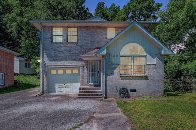 4905 Algonquin Trl, Antioch, TN 37013 - view of front of home featuring a garage, brick siding, and driveway
