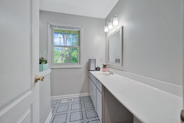 4905 Algonquin Trl, Antioch, TN 37013 - bathroom featuring baseboards, vanity, and tile patterned floors