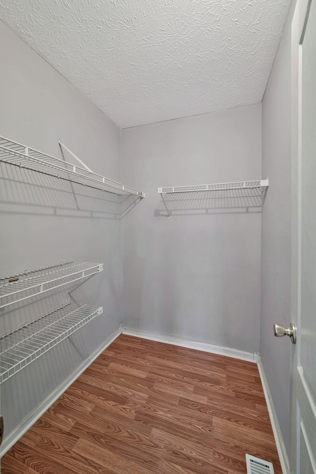 4905 Algonquin Trl, Antioch, TN 37013 - spacious closet featuring wood finished floors