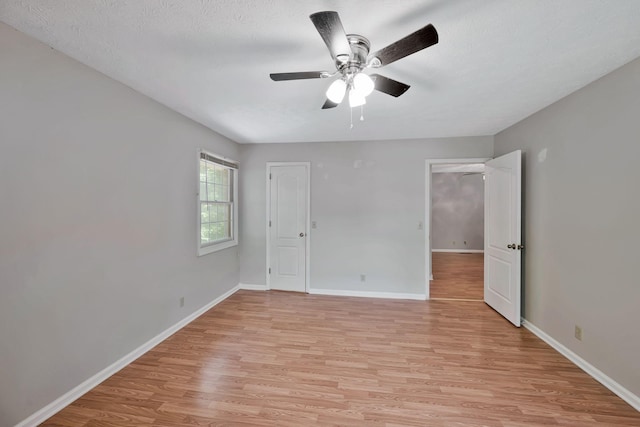 4905 Algonquin Trl, Antioch, TN 37013 - unfurnished bedroom with light wood-type flooring, baseboards, and a ceiling fan