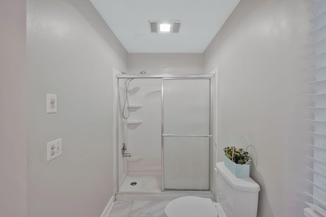 4905 Algonquin Trl, Antioch, TN 37013 - bathroom with toilet, marble finish flooring, and a shower stall