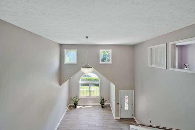 4905 Algonquin Trl, Antioch, TN 37013 - entrance foyer featuring baseboards, a baseboard radiator, and a textured ceiling