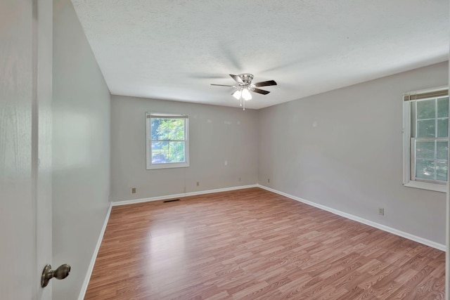 4905 Algonquin Trl, Antioch, TN 37013 - unfurnished room featuring a ceiling fan, light wood-style floors, baseboards, and a textured ceiling