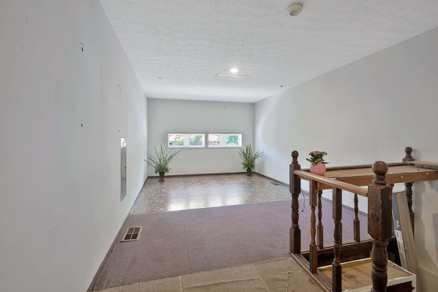 4905 Algonquin Trl, Antioch, TN 37013 - corridor featuring a textured ceiling and carpet