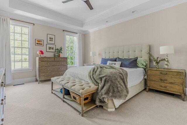 1422 Primrose Ln, Franklin, TN 37064 - bedroom with ornamental molding, light carpet, a tray ceiling, baseboards, and ceiling fan