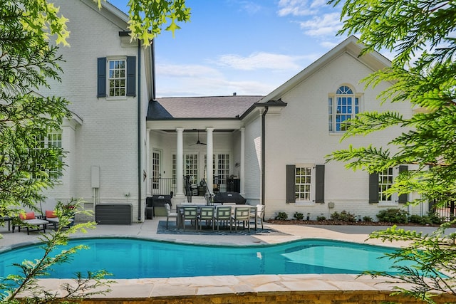 1422 Primrose Ln, Franklin, TN 37064 - swimming pool featuring a patio, ceiling fan, and outdoor dining area