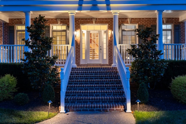 9166 Sydney Ln, Brentwood, TN 37027 - property entrance featuring a porch and brick siding