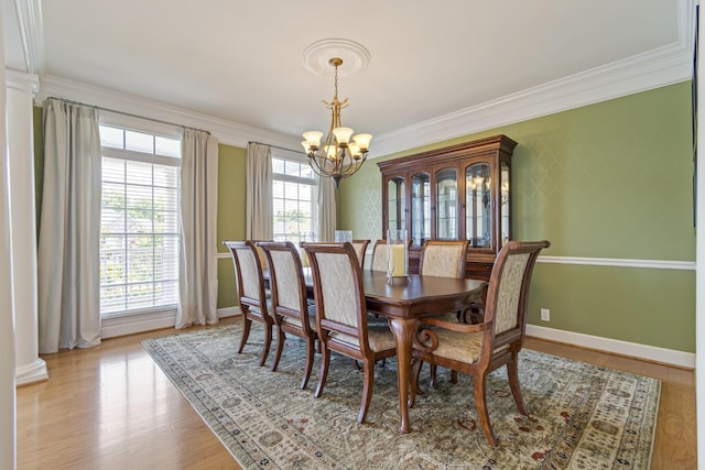 9166 Sydney Ln, Brentwood, TN 37027 - dining area with a chandelier, ornamental molding, light wood-style flooring, and baseboards