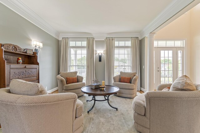 9166 Sydney Ln, Brentwood, TN 37027 - living room featuring ornate columns, crown molding, healthy amount of natural light, baseboards, and wood finished floors