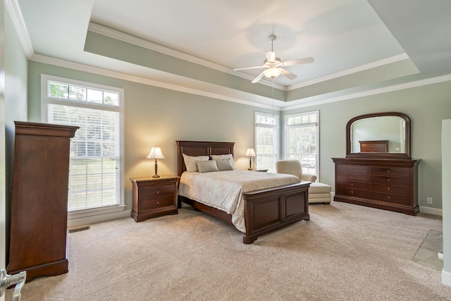 9166 Sydney Ln, Brentwood, TN 37027 - bedroom with a tray ceiling, light colored carpet, ornamental molding, and a ceiling fan