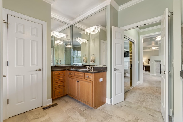 9166 Sydney Ln, Brentwood, TN 37027 - bathroom with crown molding, vanity, a ceiling fan, and baseboards