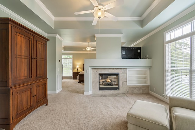 9166 Sydney Ln, Brentwood, TN 37027 - living area with a ceiling fan, light colored carpet, a multi sided fireplace, crown molding, and baseboards