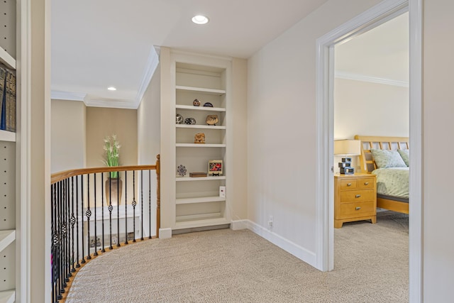 9166 Sydney Ln, Brentwood, TN 37027 - hallway with carpet, built in shelves, ornamental molding, baseboards, and recessed lighting