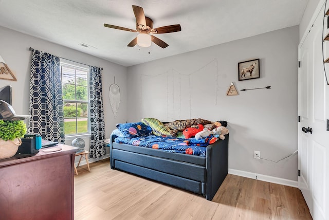 241 Holly Grove Rd, Lewisburg, TN 37091 - bedroom with wood finished floors, baseboards, and ceiling fan