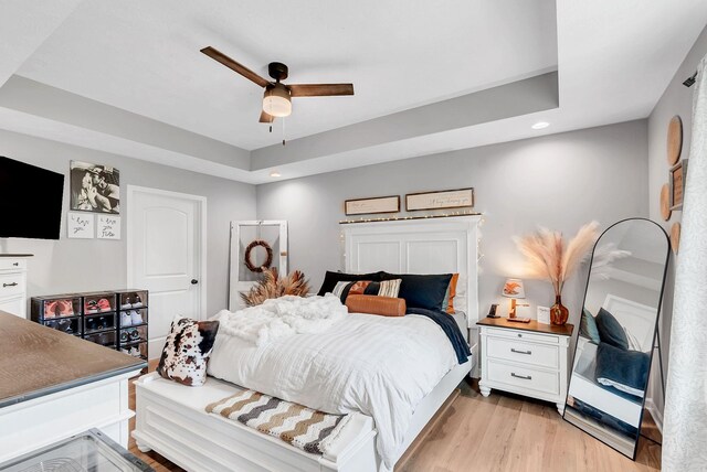 241 Holly Grove Rd, Lewisburg, TN 37091 - bedroom featuring a raised ceiling, light wood-style flooring, recessed lighting, and ceiling fan