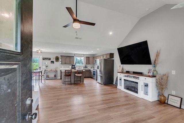 241 Holly Grove Rd, Lewisburg, TN 37091 - living room featuring a ceiling fan, light wood-style flooring, recessed lighting, and high vaulted ceiling